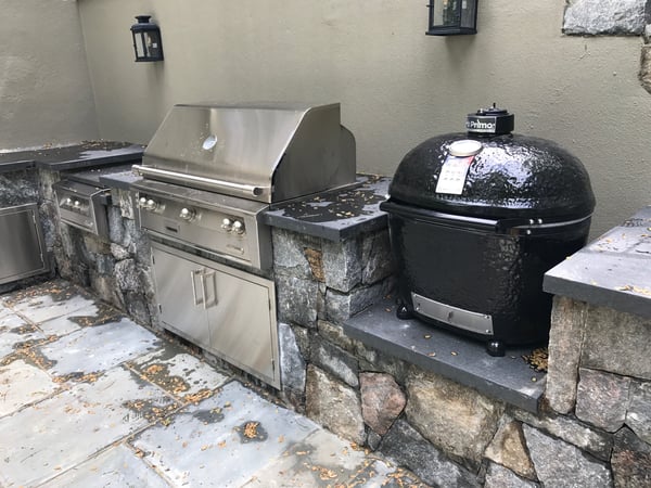 Primo grill in outdoor kitchen setup